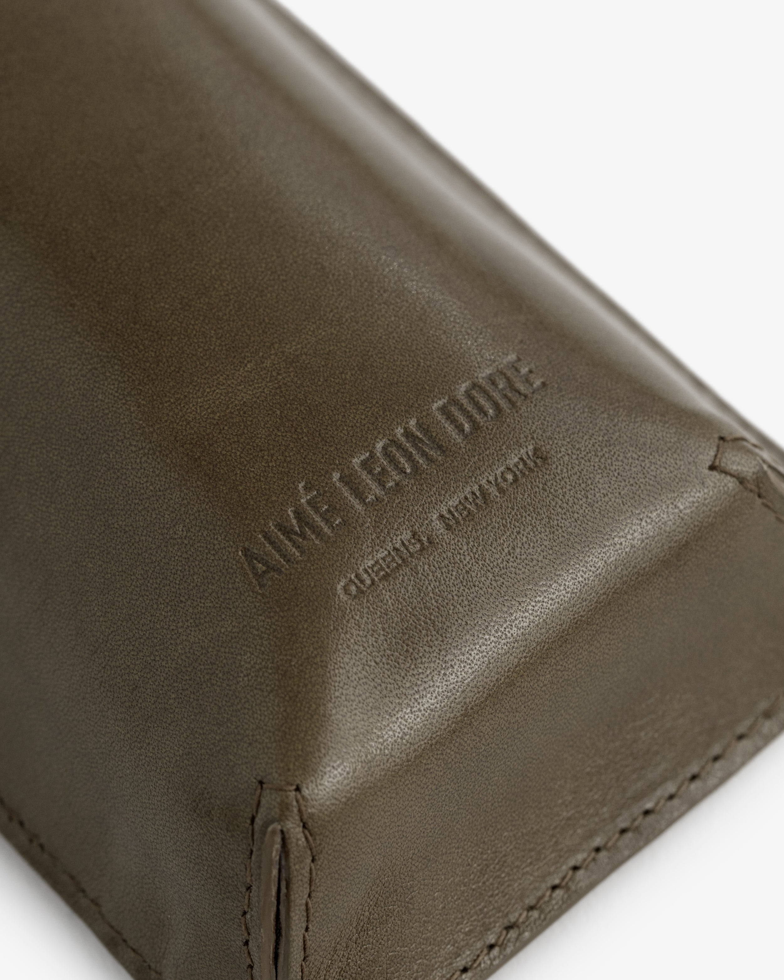 Debossed Logo Leather Tote Bag