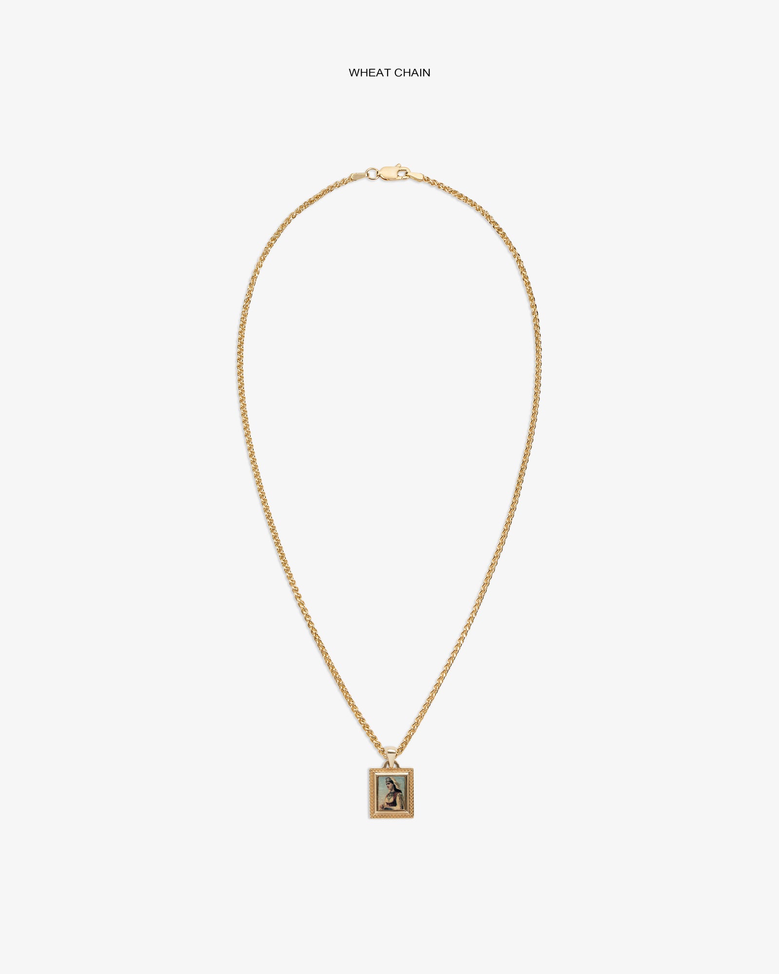 14Kt Gold Pendant: Wheat chain necklace with engraved rectangular charm, shown on a white background.