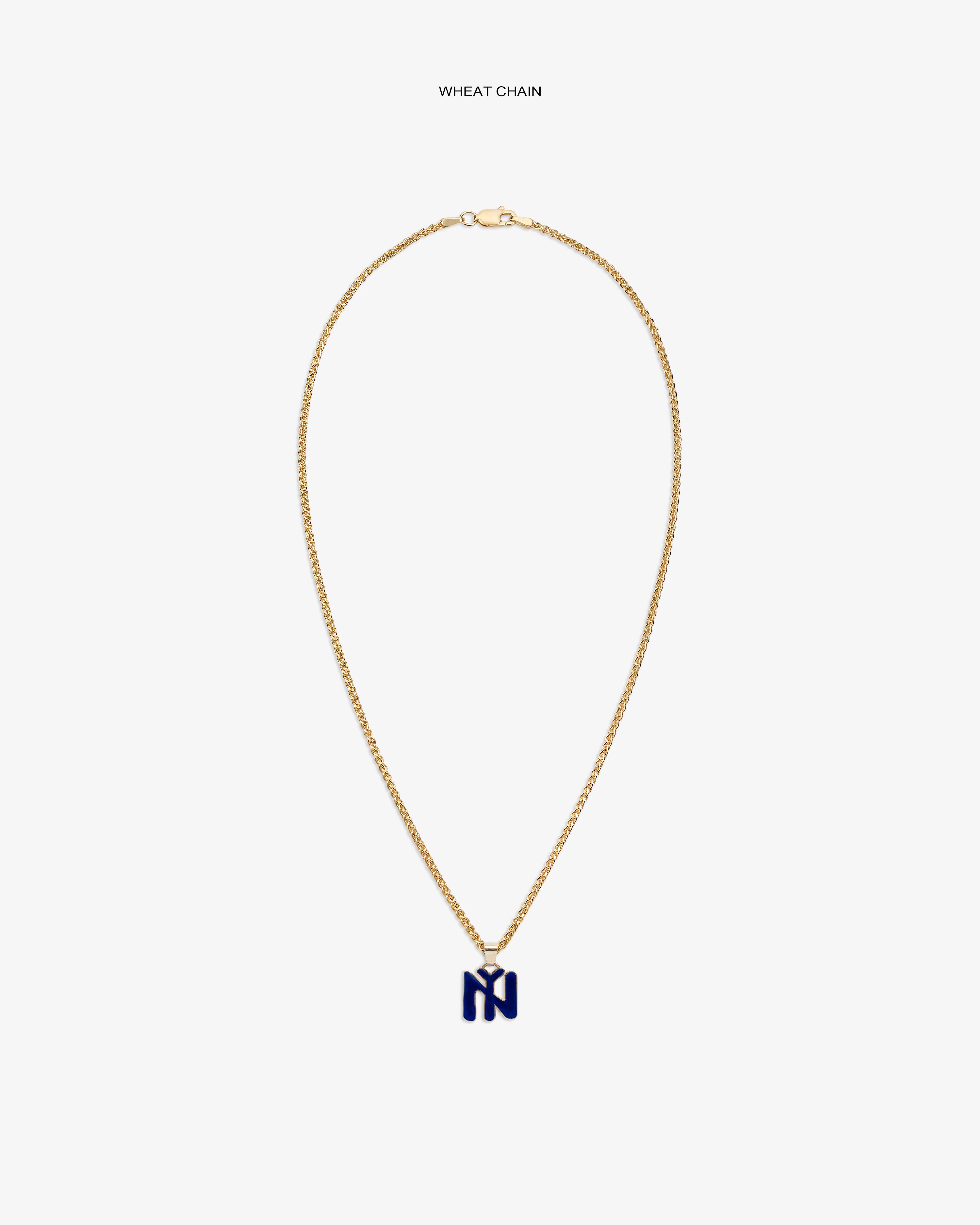 14Kt Gold Pendant: Wheat chain necklace with blue N-shaped pendant on white background.