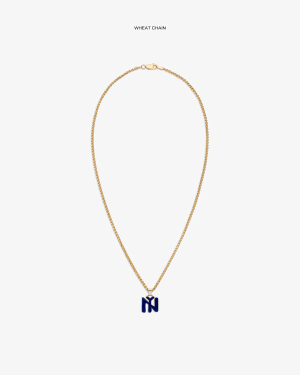 14Kt Gold Pendant: Wheat chain necklace with blue N-shaped pendant on white background.