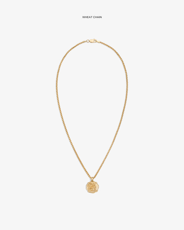 14Kt Gold Coin Pendant with a wheat chain shown on a plain white background.