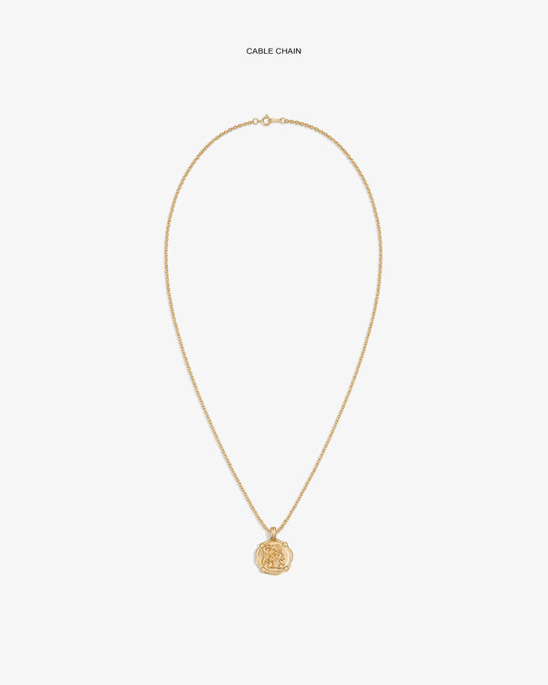 14Kt Gold Coin Pendant necklace with a gold cable chain on a plain white background.