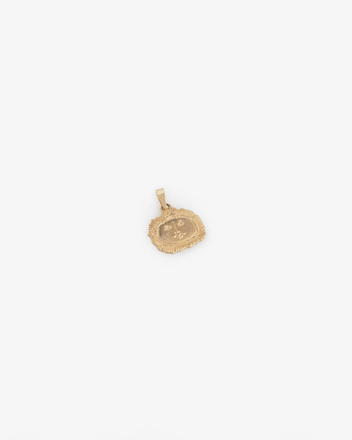 14Kt Gold Pendant with textured edge and embossed face, shown on a plain white background.