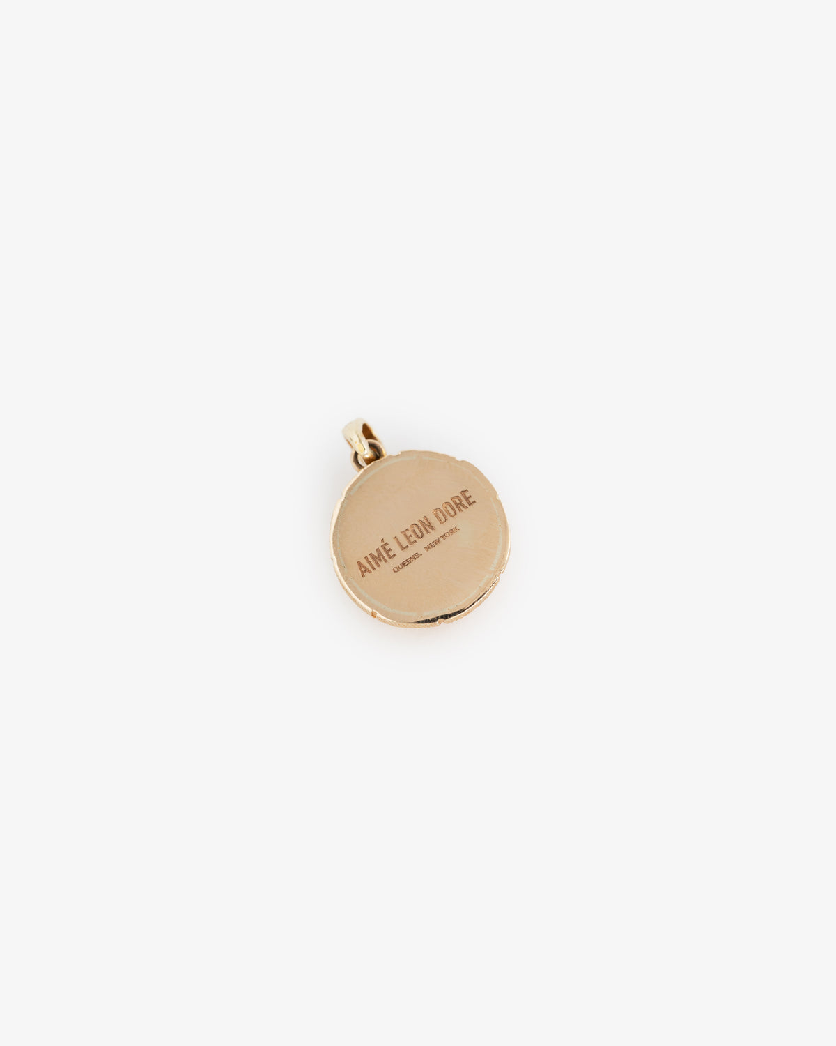 14Kt Gold Basketball Pendant with AIMÉ LEON DORE engraving, displayed on a plain white background.