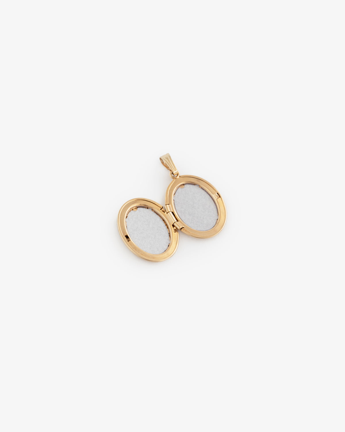 14Kt Gold oval locket pendant opens to reveal two photo spaces, displayed on a white background.