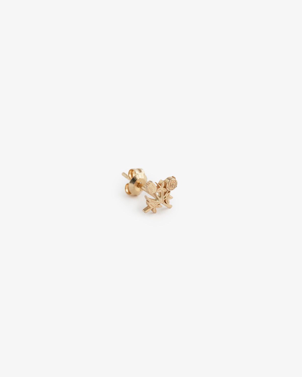 14Kt Gold Crest Earring: a small gold stud shaped like a rose with a leaf, shown on a white background.