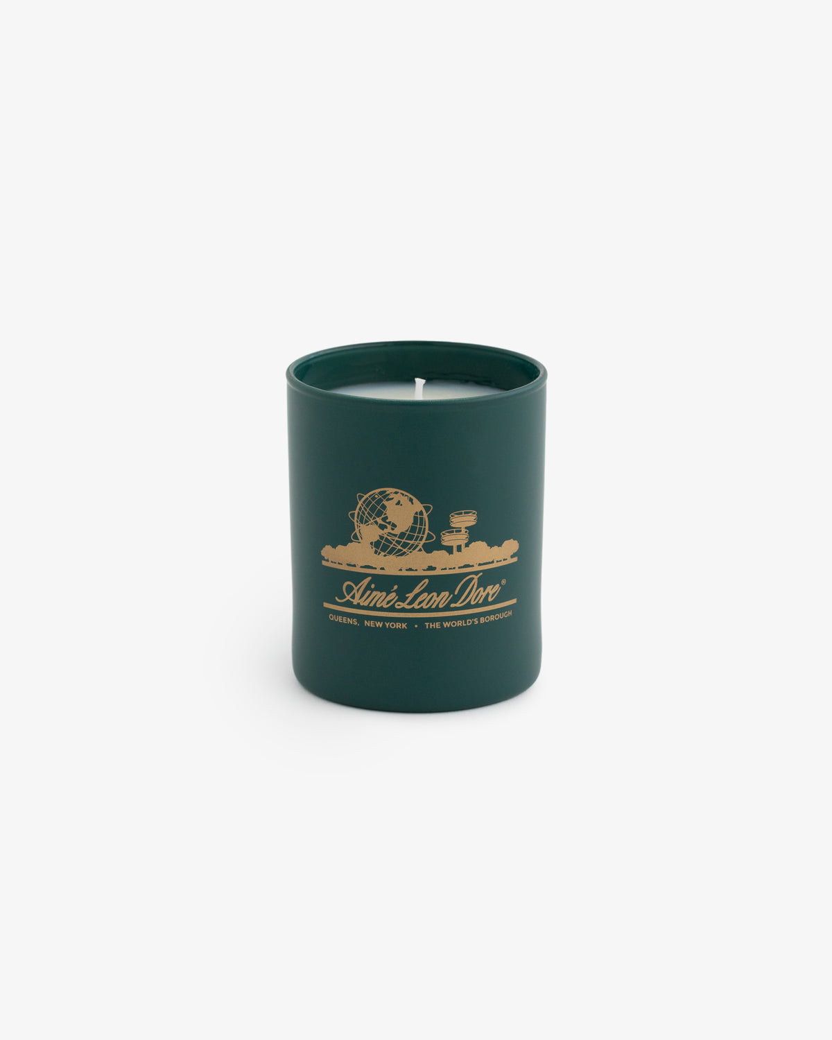 Dark green Unisphere Candle jar with gold globe and clouds graphic, labeled "Aime Leon Dore," on white background.