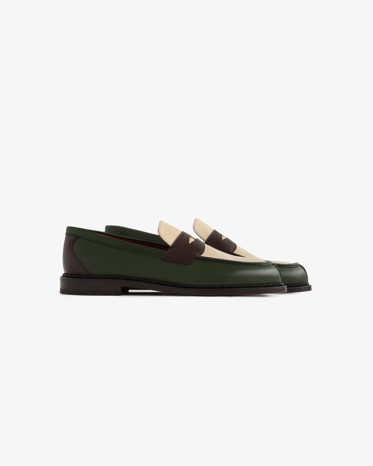 Queens Crest Loafer in green, cream, and brown leather with low heel, shown side profile on white background.