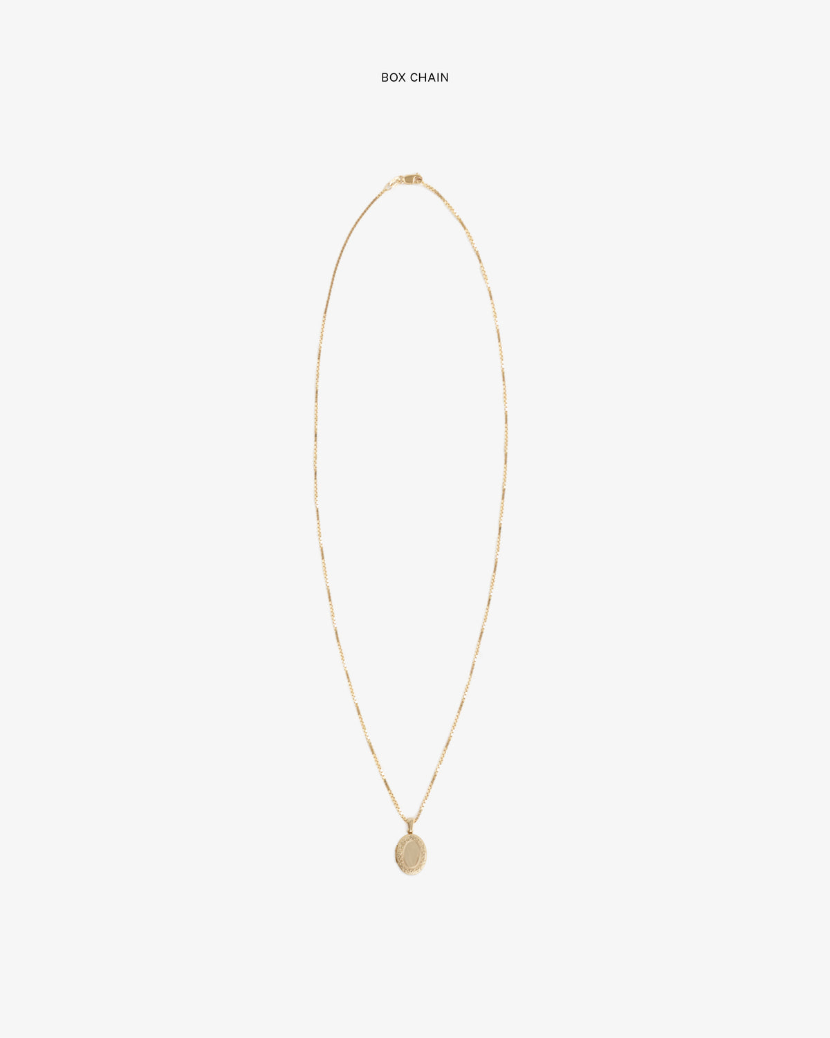 14Kt Gold Pendant on a box chain, shown against a plain white background.