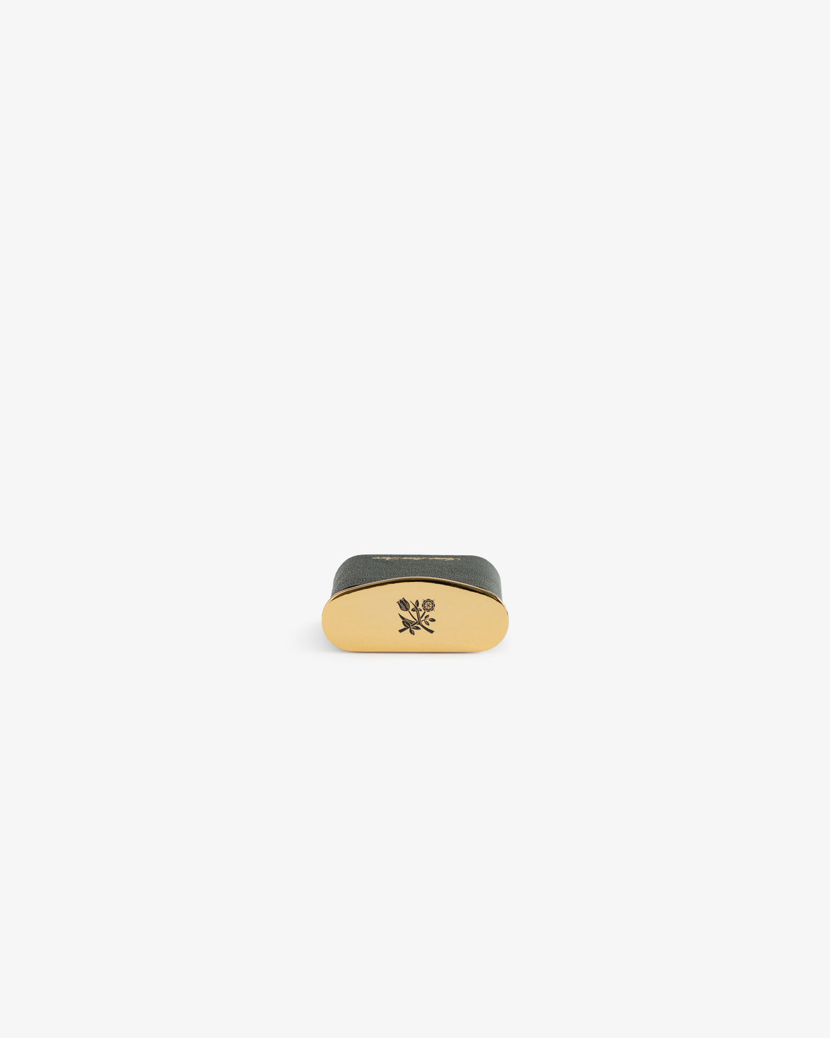 Small, oval gold Queens Crest Leather Portable Ashtray with black top and flower logo, on a white background.
