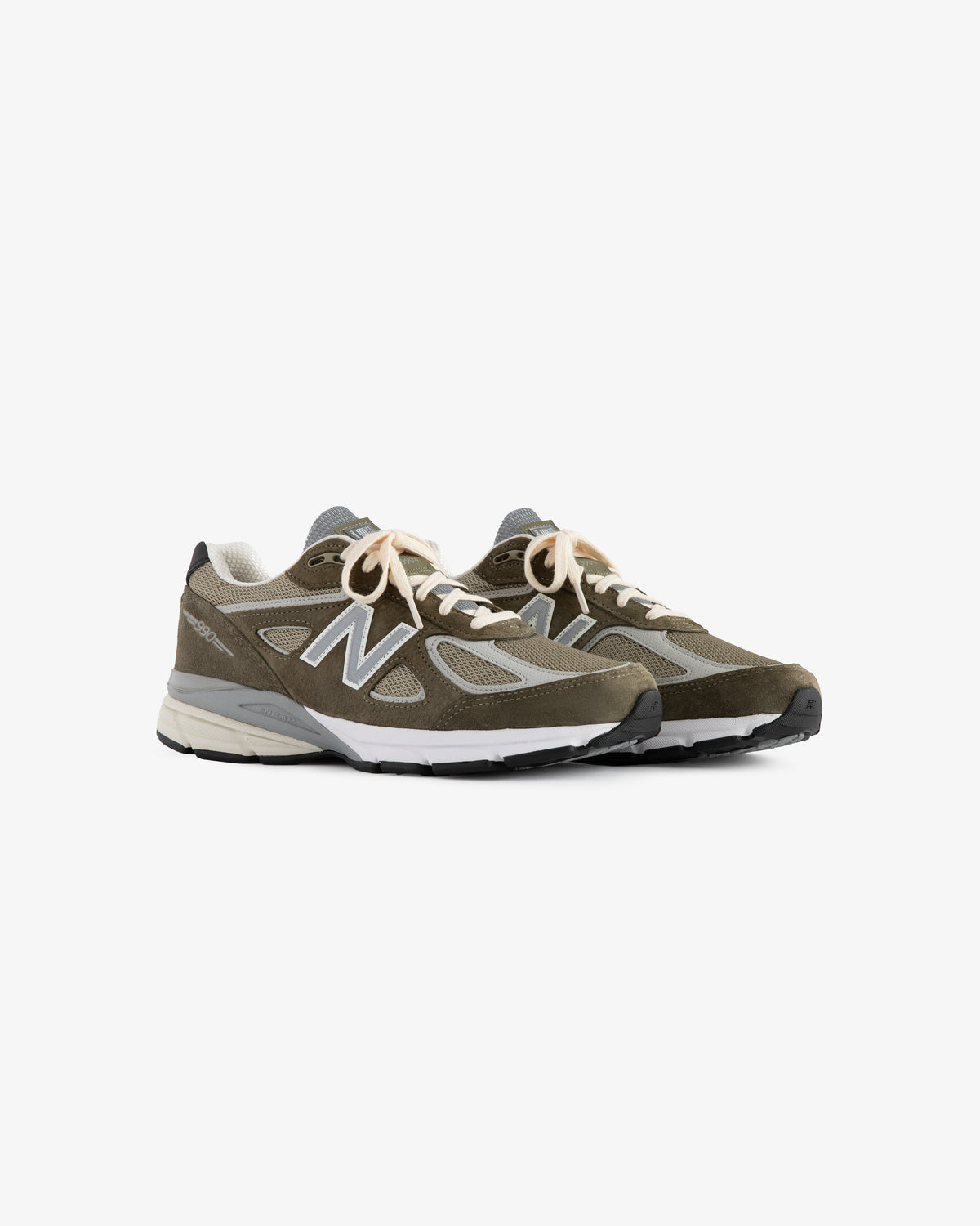 A pair of ALD / New Balance 990v4 in olive green and gray with white laces and a white sole on a white background.