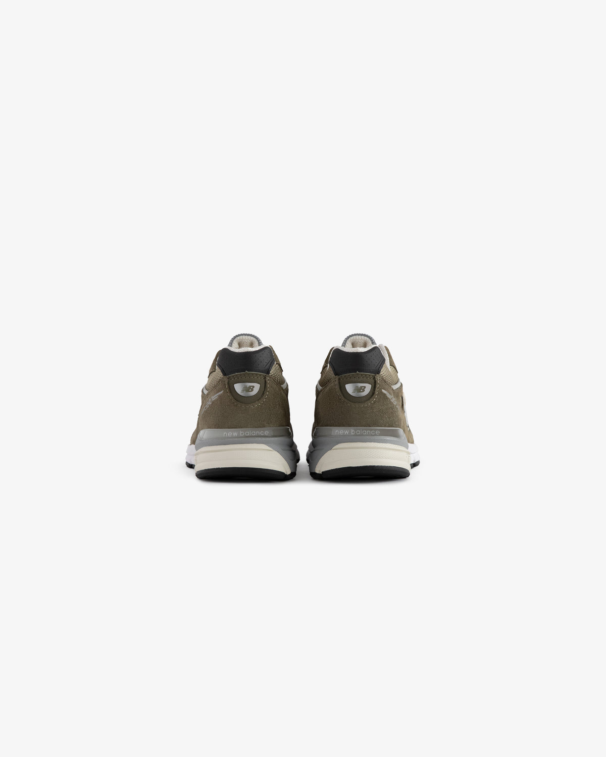 ALD / New Balance 990v4 sneakers in olive green, shown from the back on a white background.