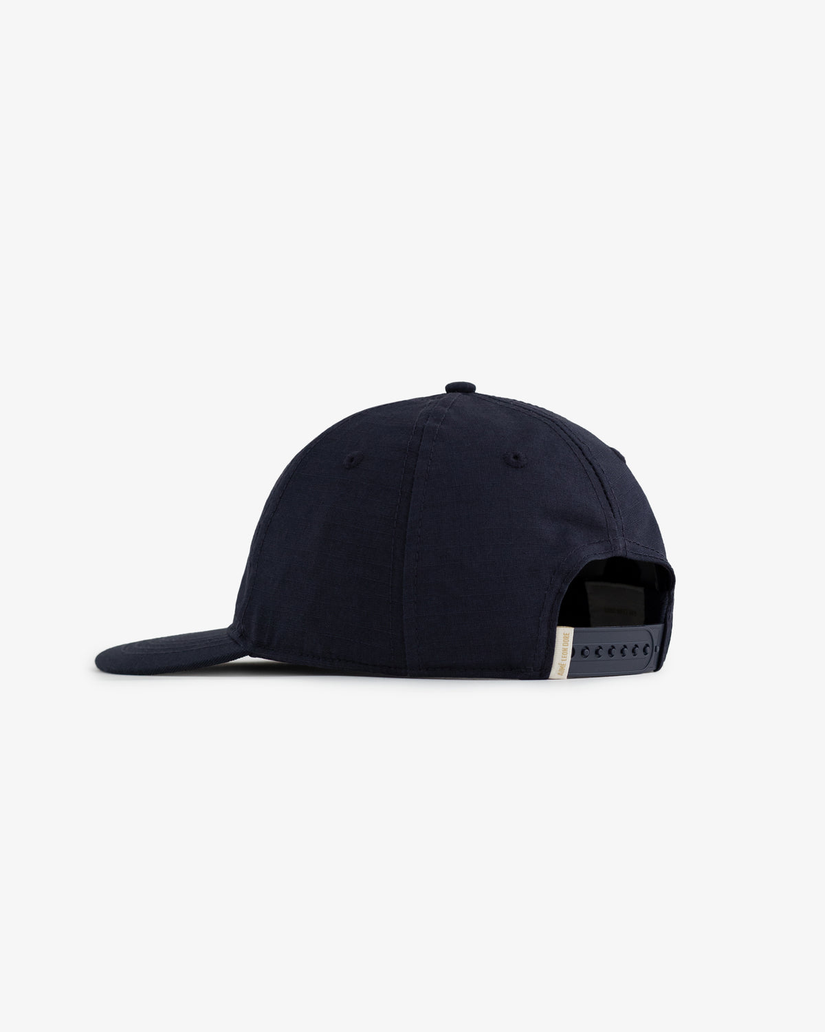 The Unisphere Hat is a navy blue baseball cap with a curved brim and an adjustable back strap.