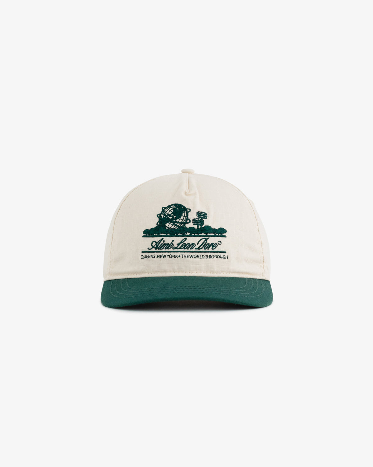 Unisphere Hat in cream with a green brim and dark green graphic and text on the front, shown from the front.