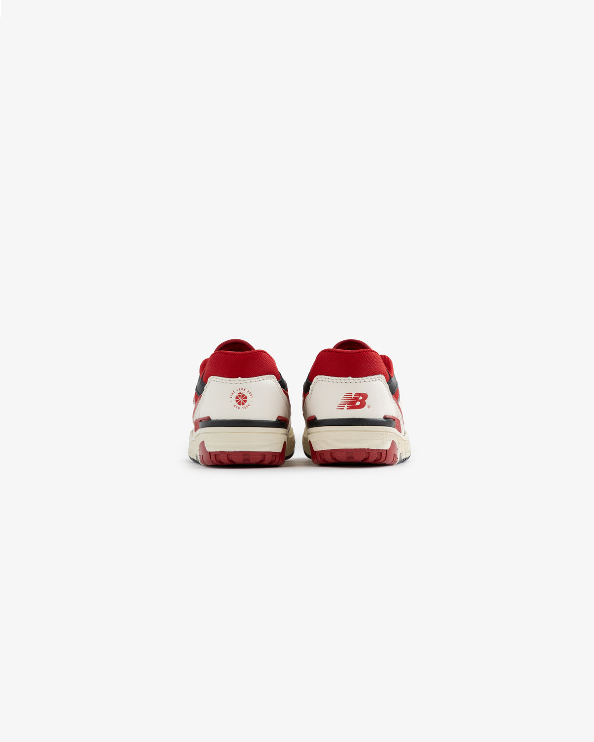 ALD / NB P550 Basketball Oxfords for Little Kids in white and red, shown from the back on a plain white background.