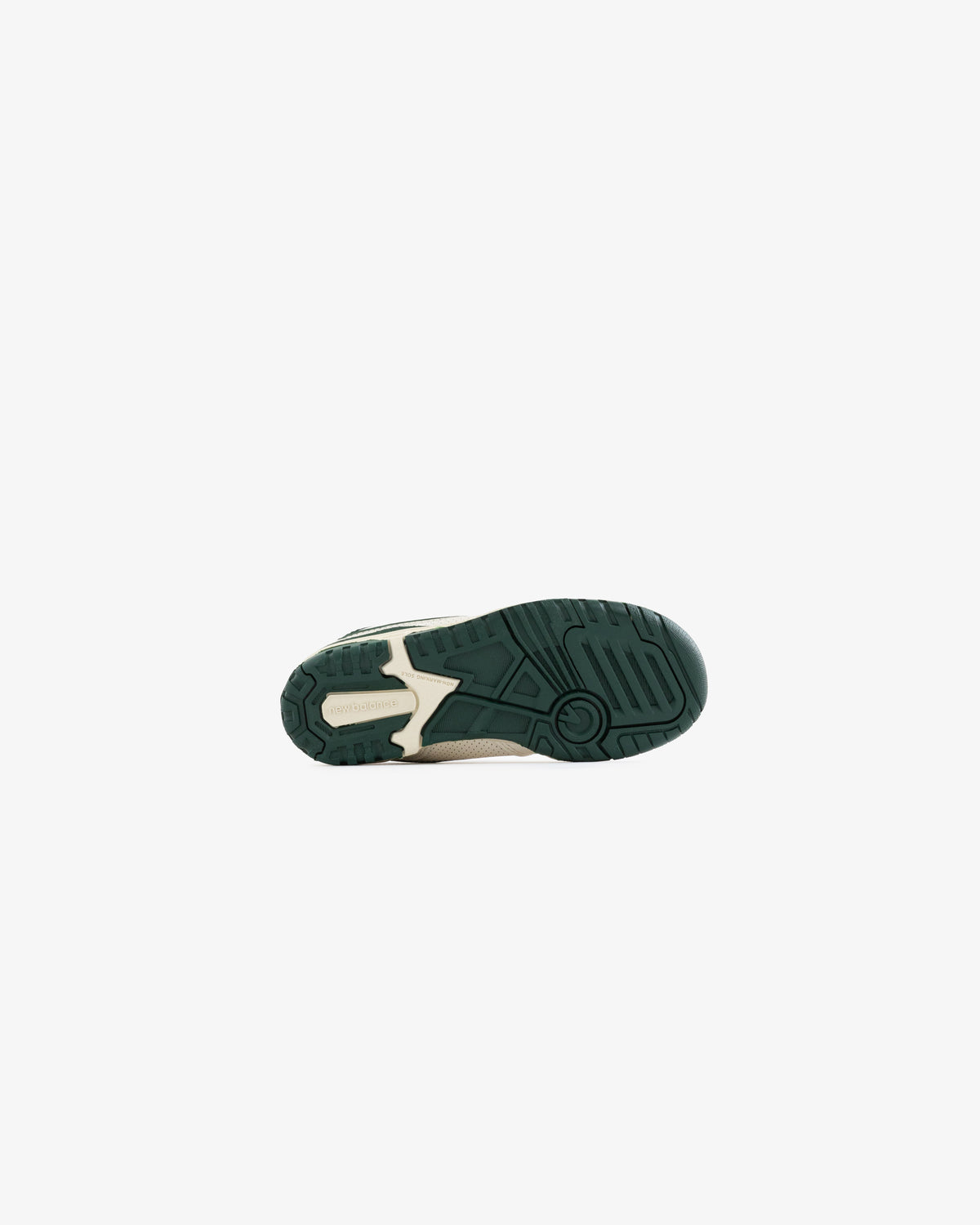 The image shows the dark green sole of the ALD / NB P550 Basketball Oxfords - Little Kids on a white background.