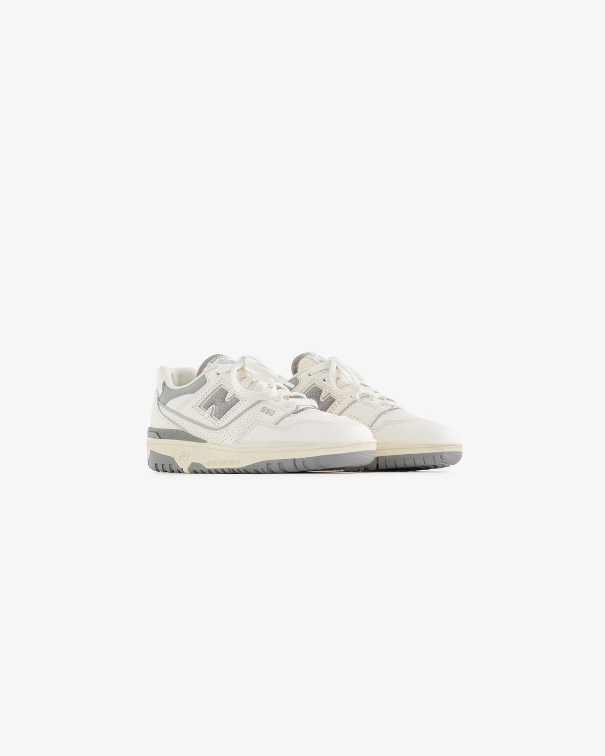 ALD / NB P550 Basketball Oxfords for little kids in white and gray with chunky soles, on a plain white background.