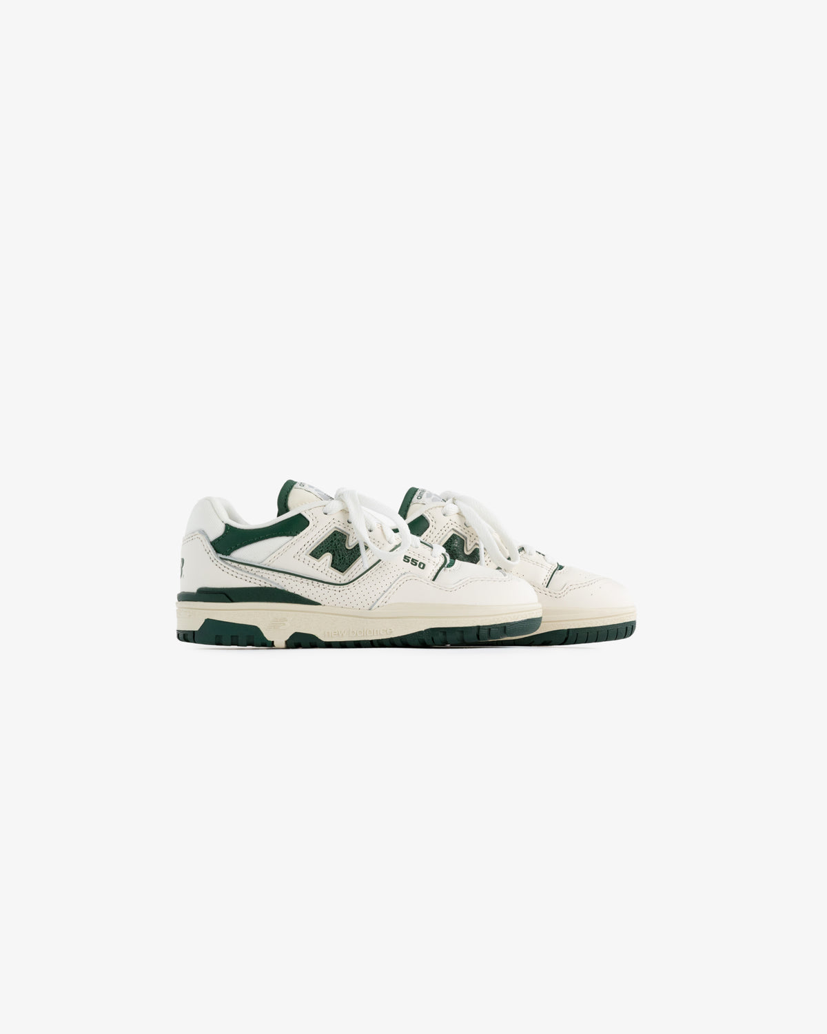 ALD / NB P550 Basketball Oxfords for little kids: white and green low-tops with laces, side logo, and dark green accents.