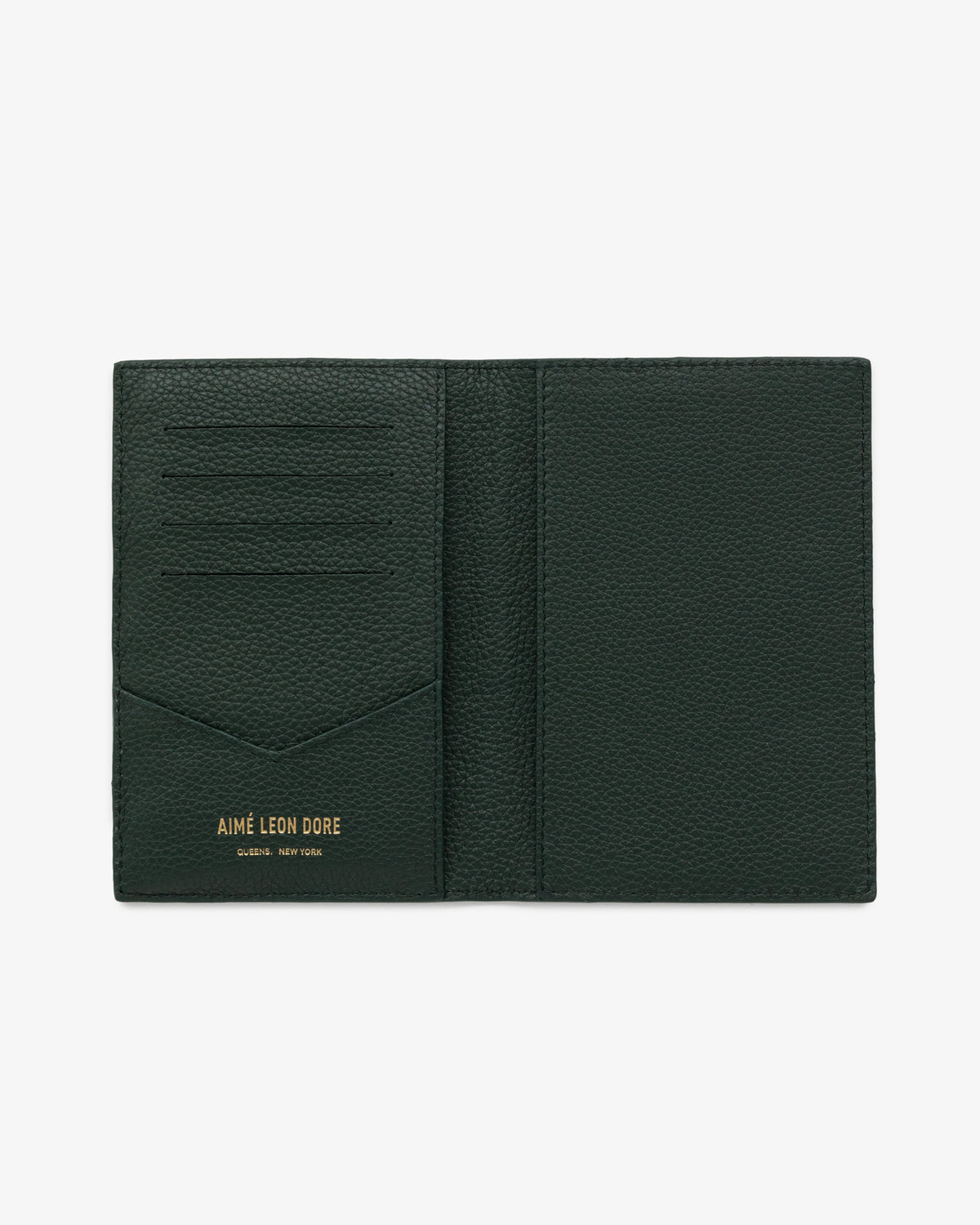 Dark green leather passport holder with multiple card slots and gold AIMÉ LEON DORE logo at the bottom left.