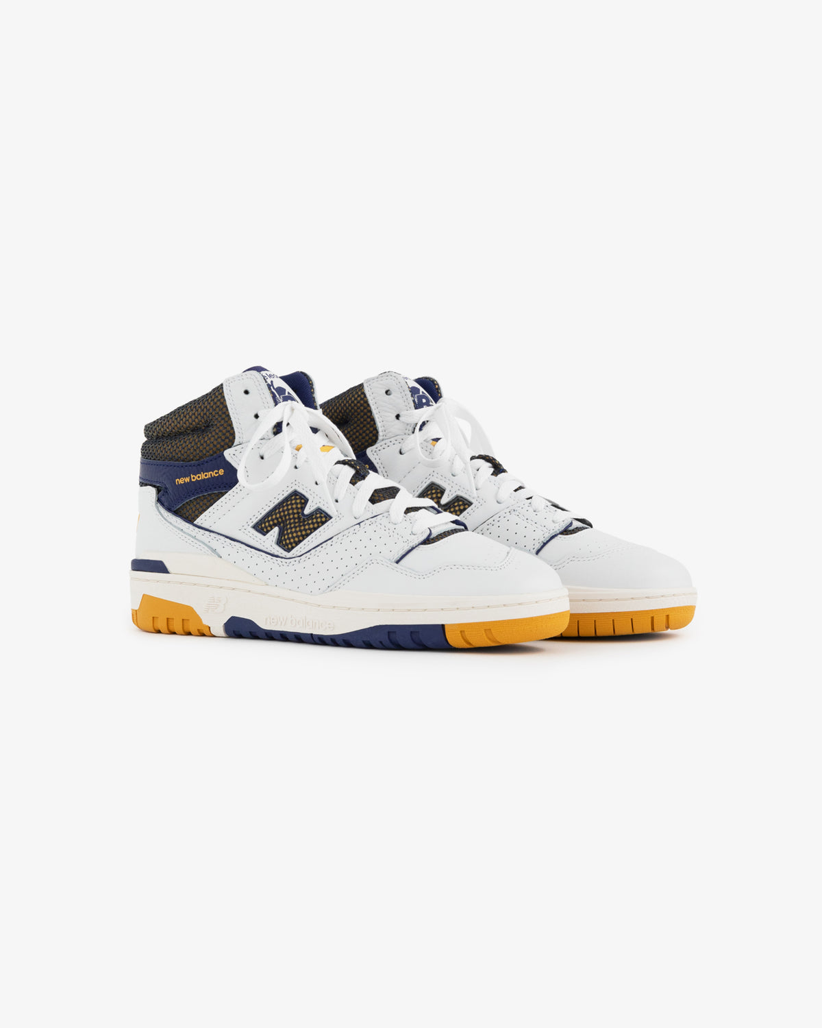 ALD / New Balance 650R white and navy high-top sneakers with yellow accents, shown on a white background.