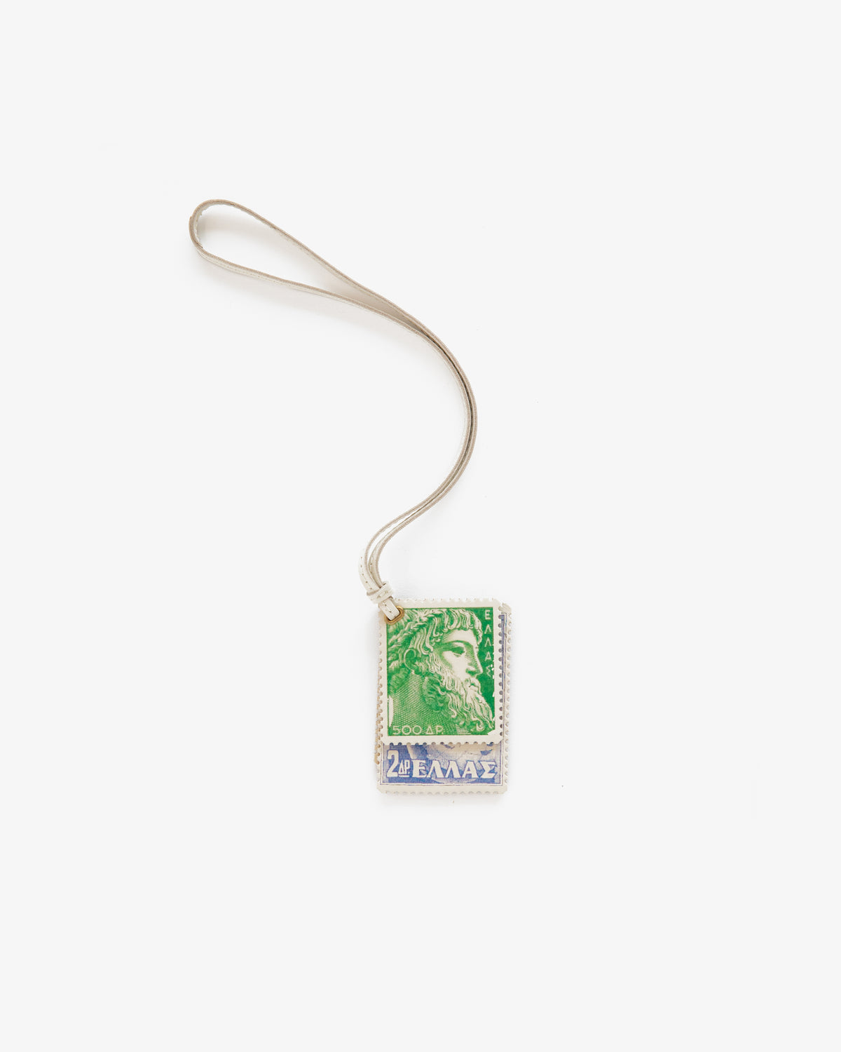 A green and blue Leather Traveler Charm with a silver loop and strap, shown on a white background.