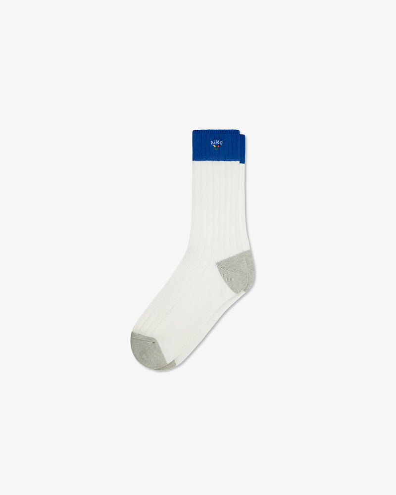 Crest Varsity Sock: White ribbed sock with grey heel/toe and blue cuff, plus small side embroidered logo.
