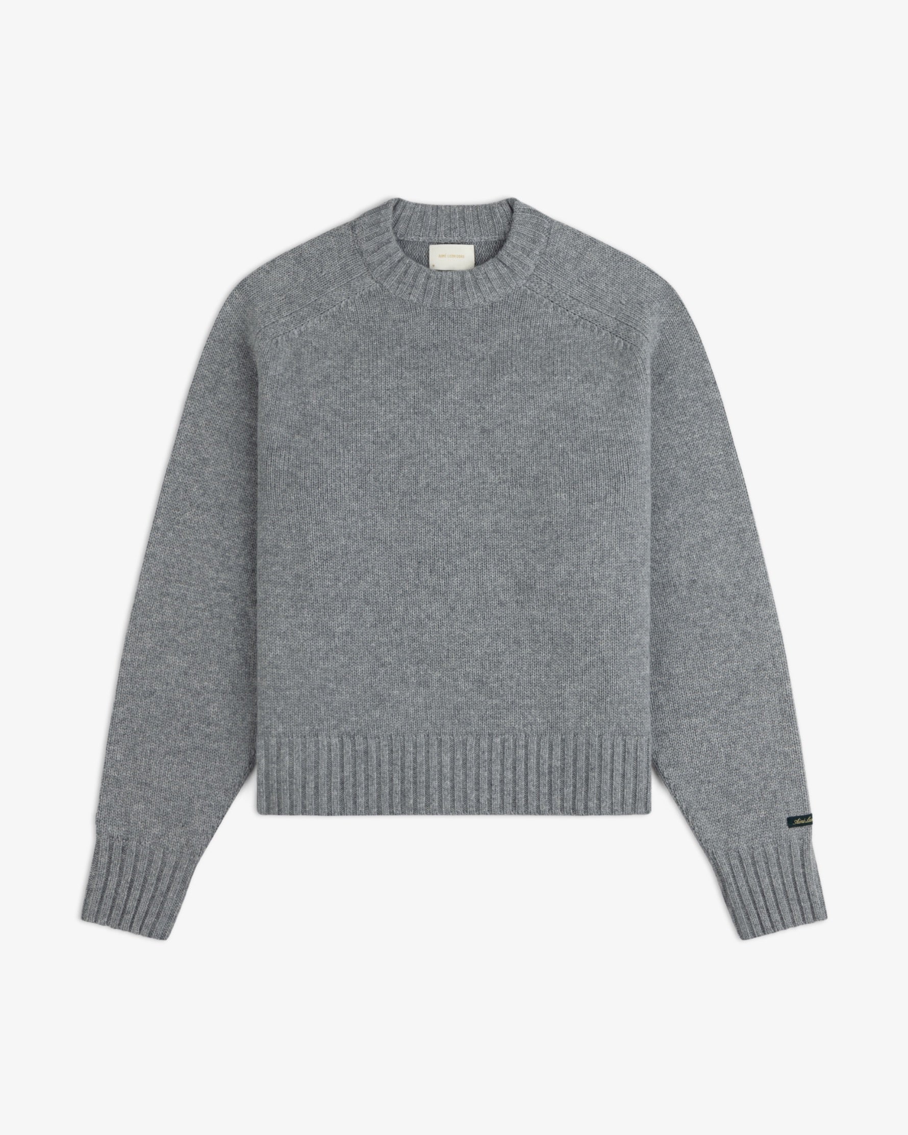 Grey Cashmere Crewneck Sweater with long sleeves and ribbed cuffs and hem.
