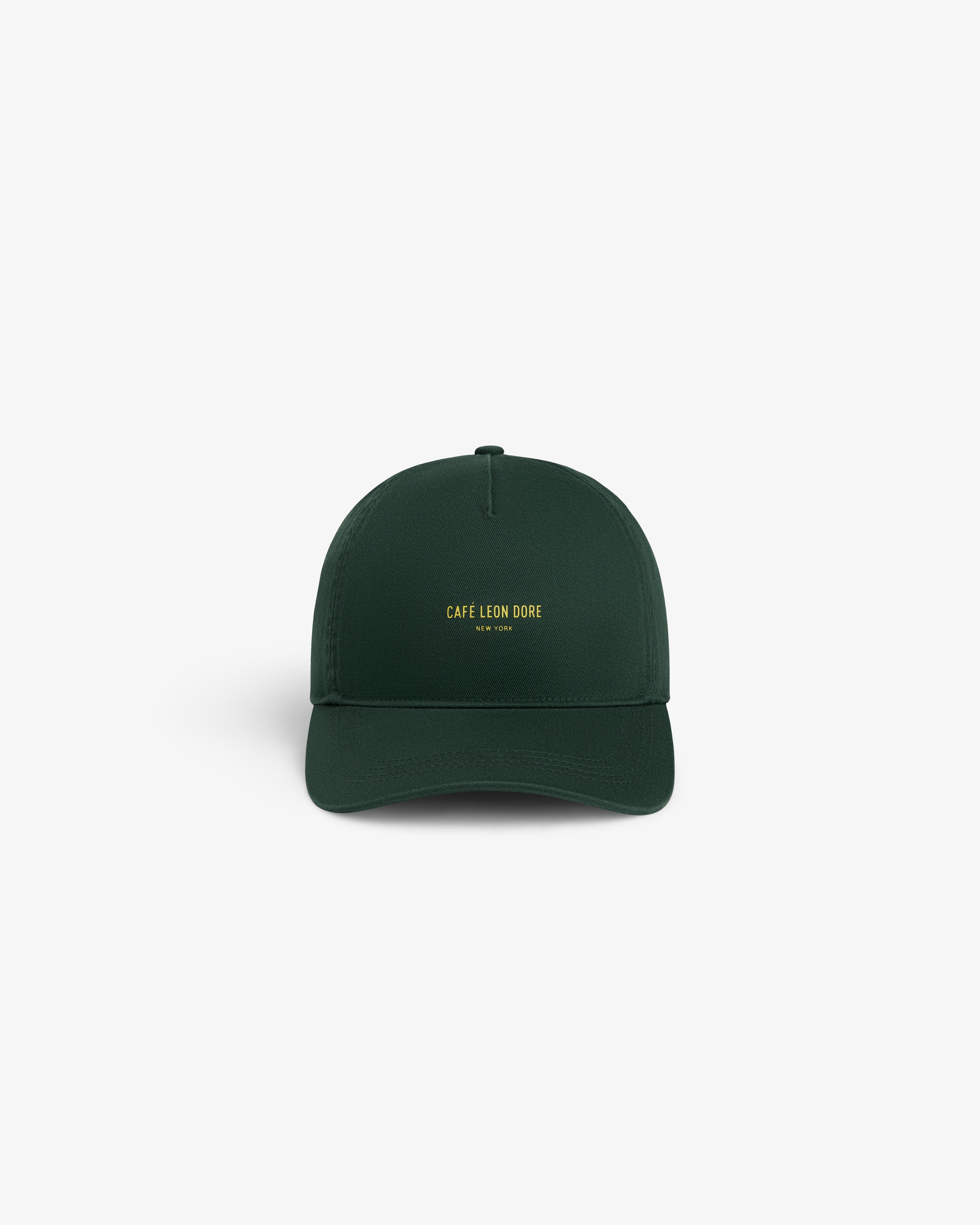 Dark green Café Leon Dore Logo Hat with small yellow “CAFÉ LEON DORE NEW YORK” text on the front.