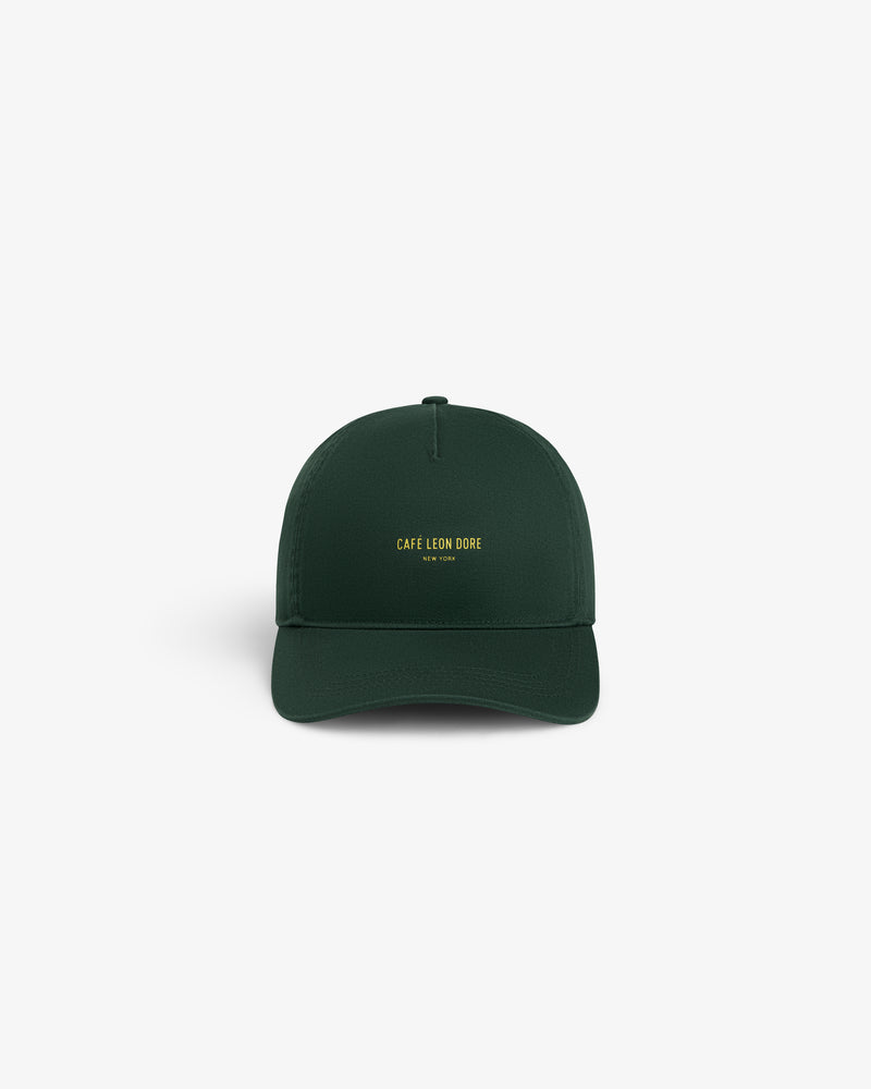 Dark green Café Leon Dore Logo Hat with small yellow “CAFÉ LEON DORE NEW YORK” text on the front.
