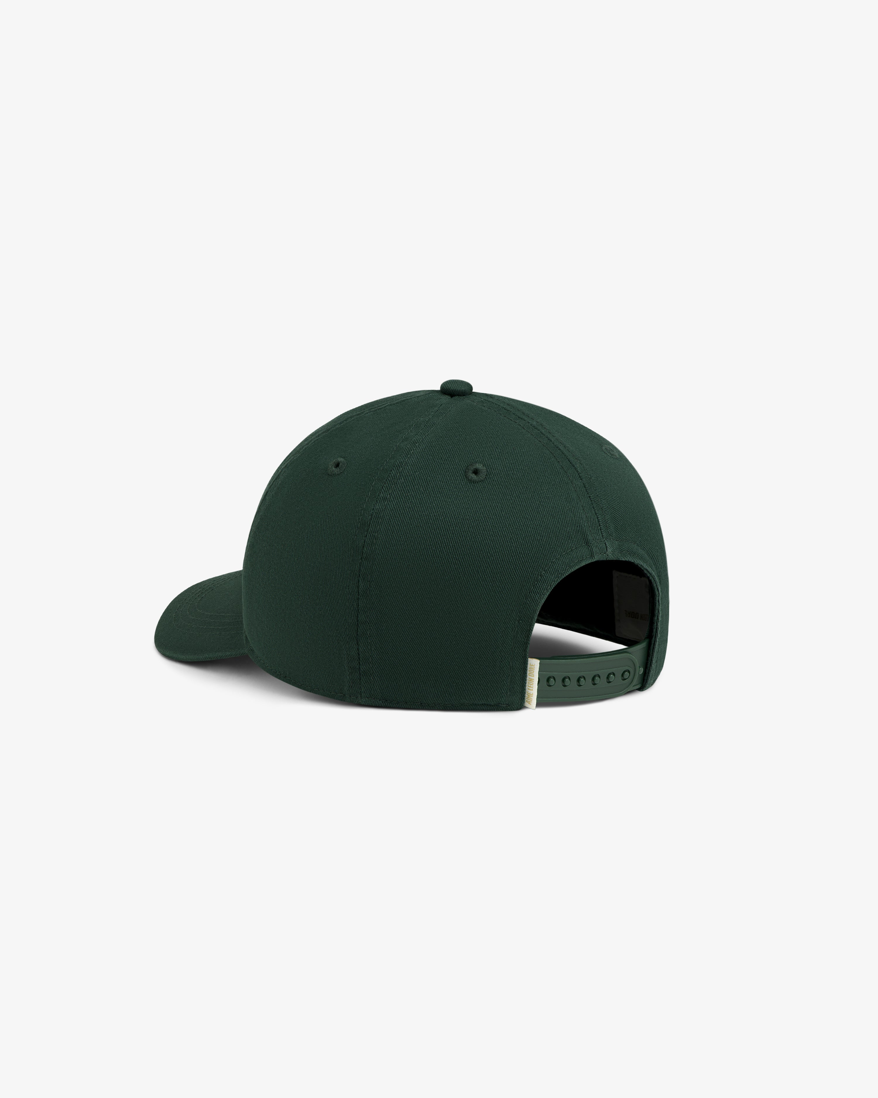 Café Leon Dore Logo Hat in dark green, shown from the back with a curved brim and adjustable snapback strap.