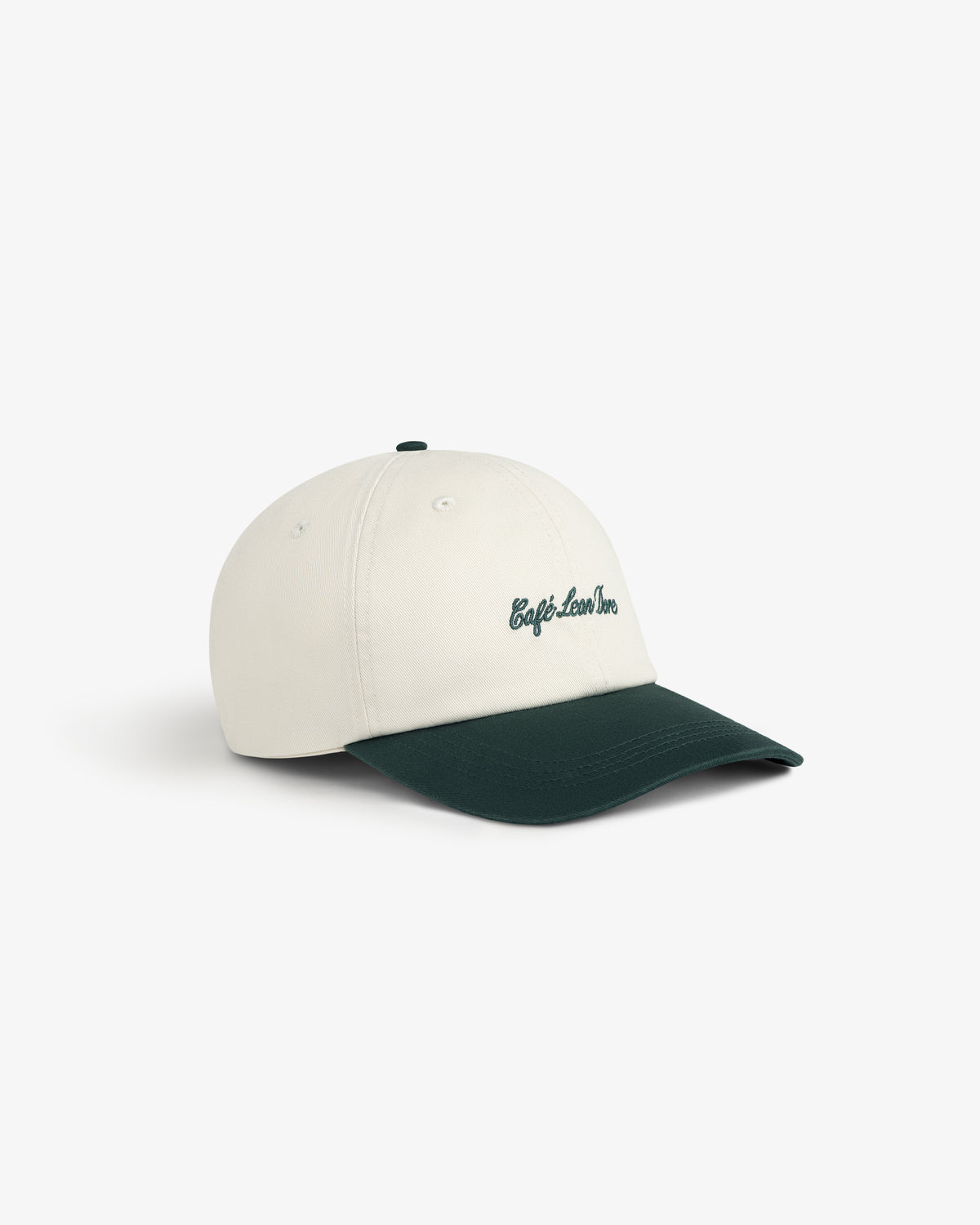 Café Leon Dore Script Hat: white cap with a dark green brim and green embroidered Café Leon Dore on the front.
