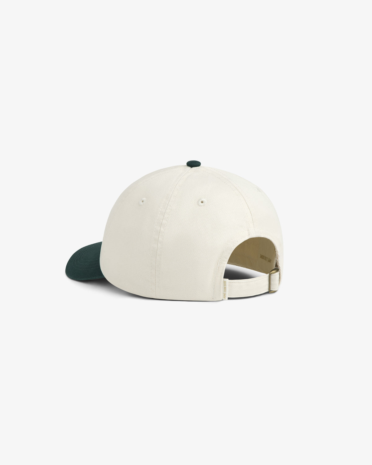 Café Leon Dore Script Hat in white with dark green brim, adjustable strap, shown from the back on white background.