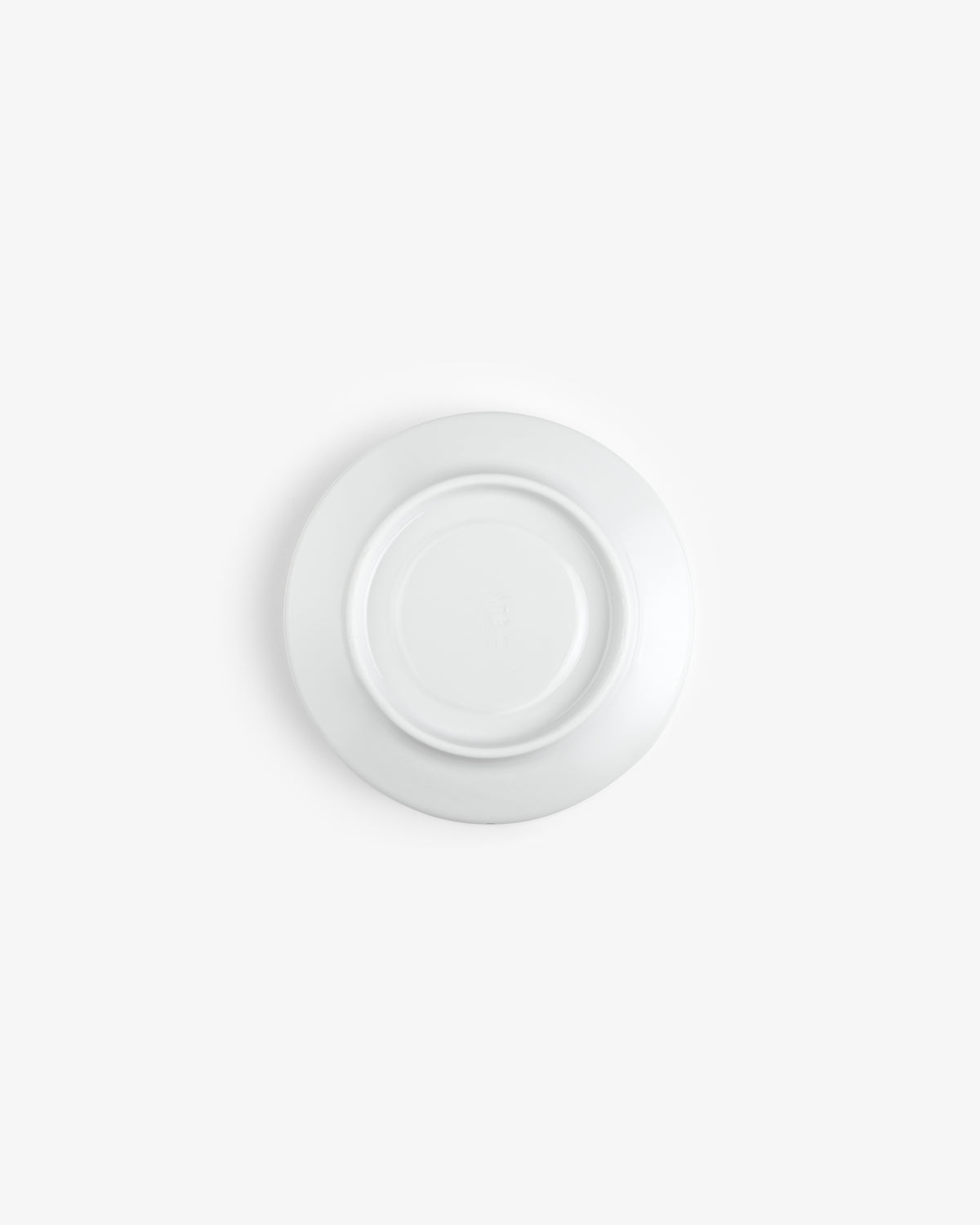 Café Leon Dore Cappuccino Cup & Saucer (Set of 6) shown upside down on a plain white background, top view.