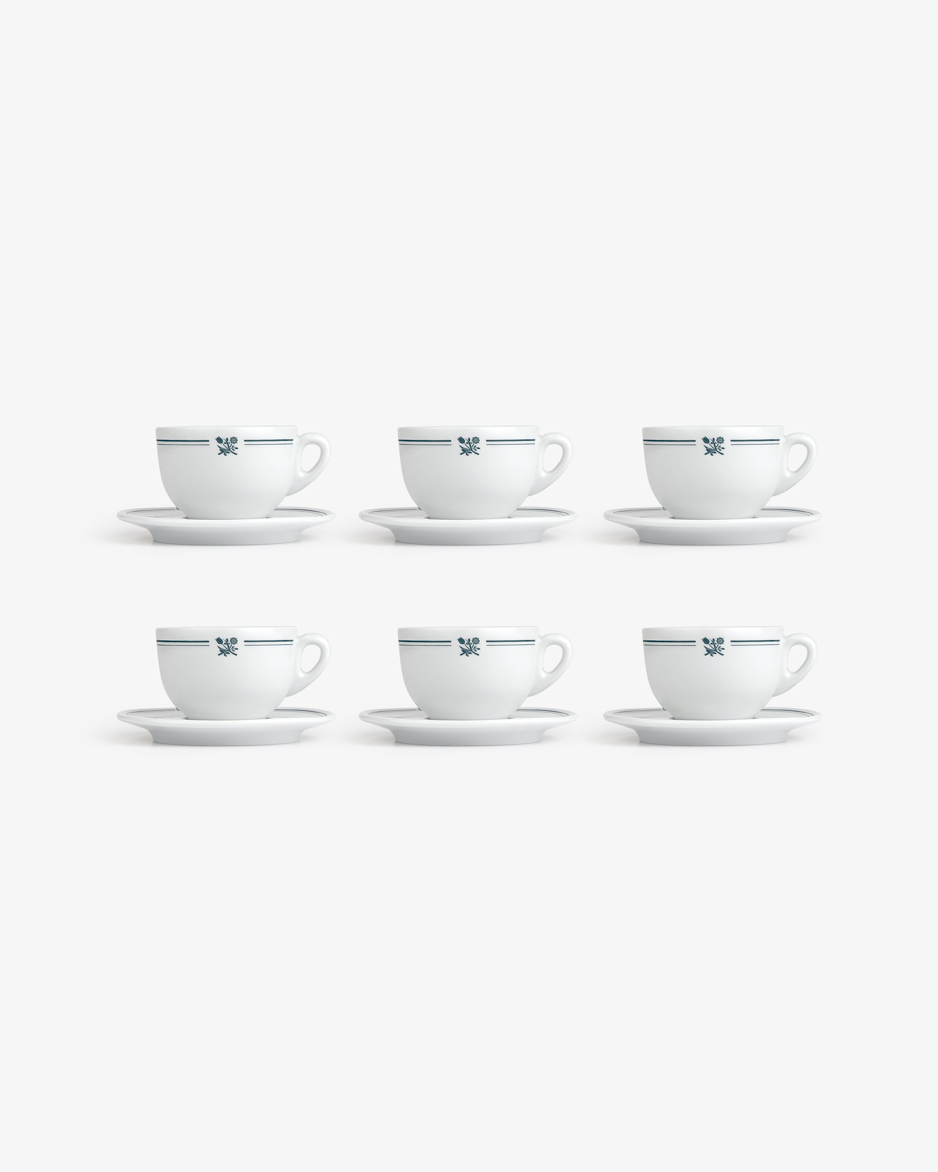 Set of 6 Café Leon Dore cappuccino cups with saucers, white with blue pattern, arranged in two rows on white background.