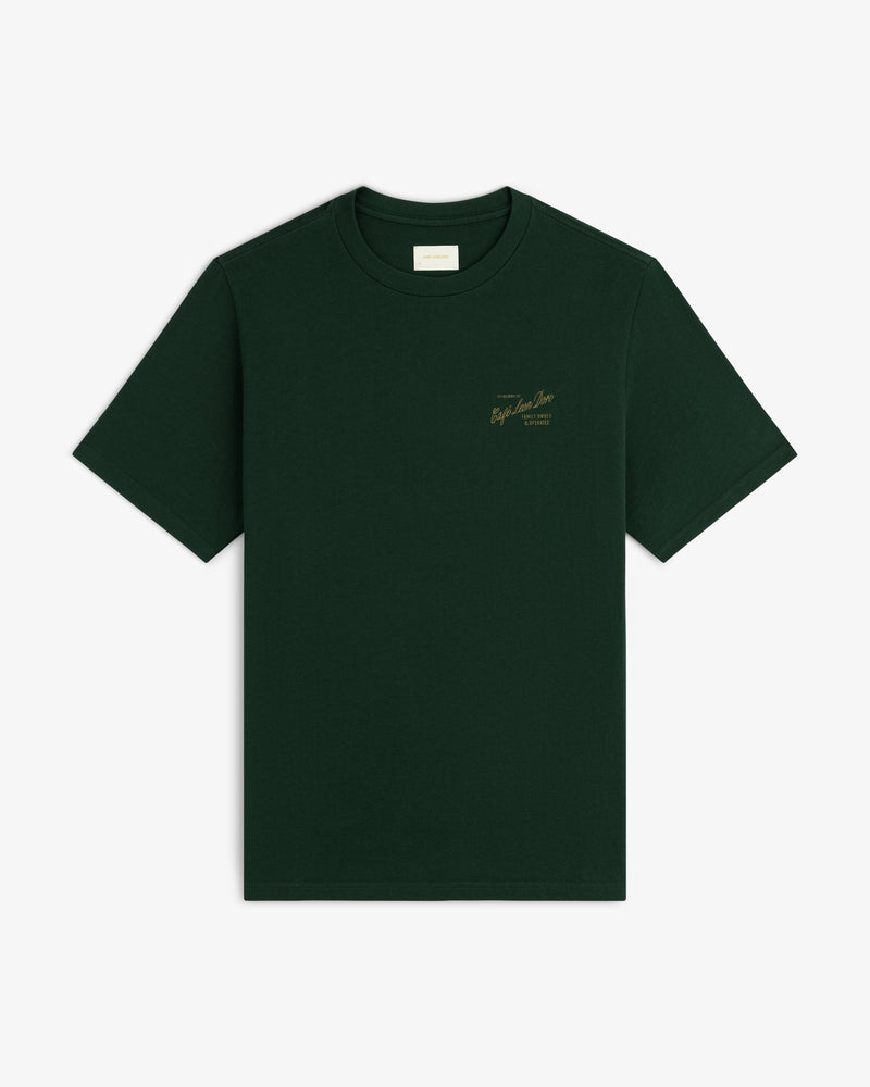 Café Leon Dore Mulberry Tee in dark green with gold chest text, shown on a white background.