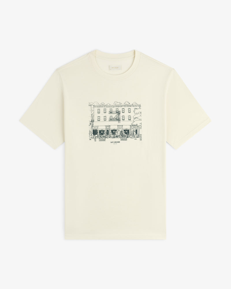 Off-white Café Leon Dore Storefront Tee with line art building and small chest text.