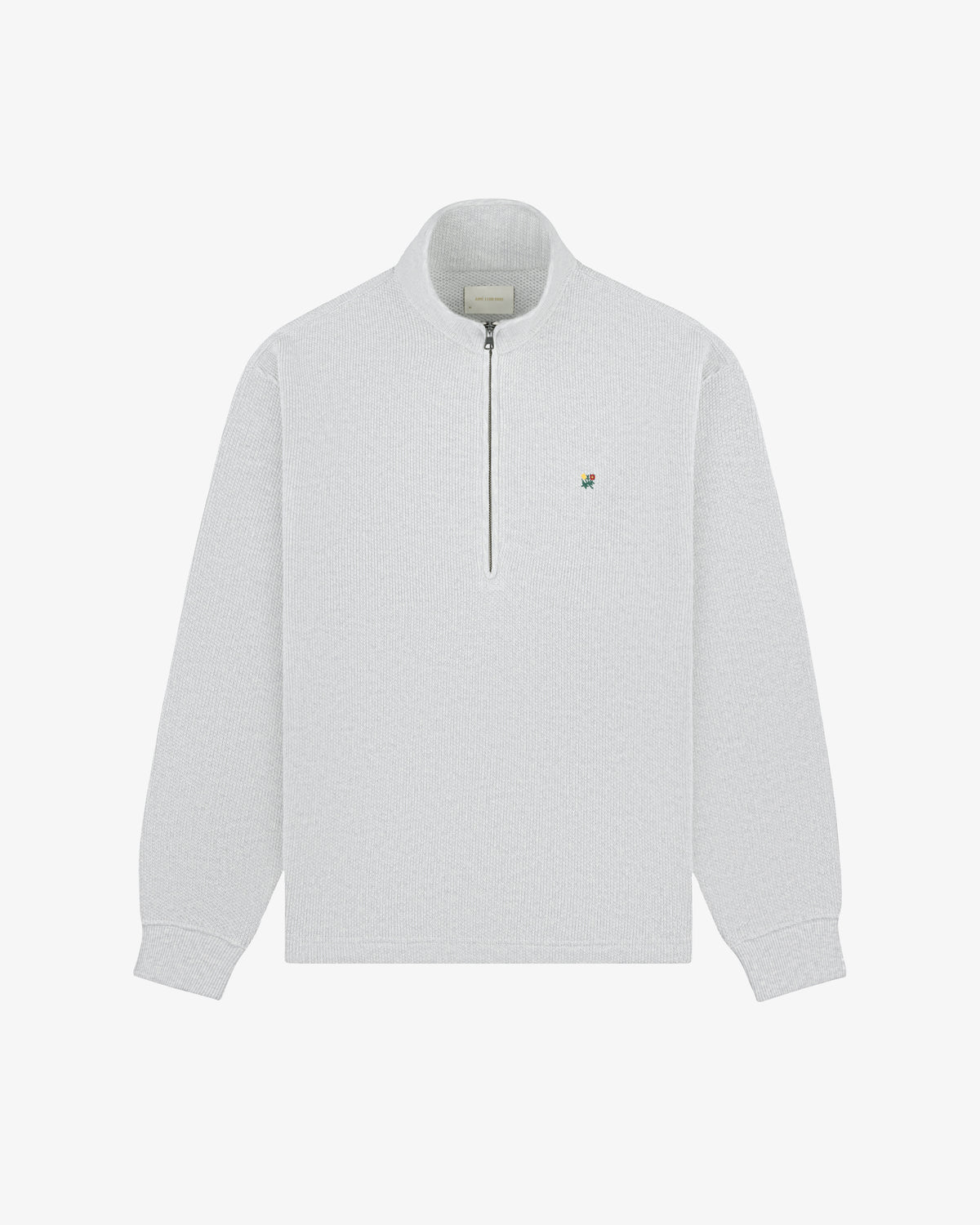 Light grey Crest Piqué Half-Zip Pullover with small embroidered logo on left chest, shown on white background.