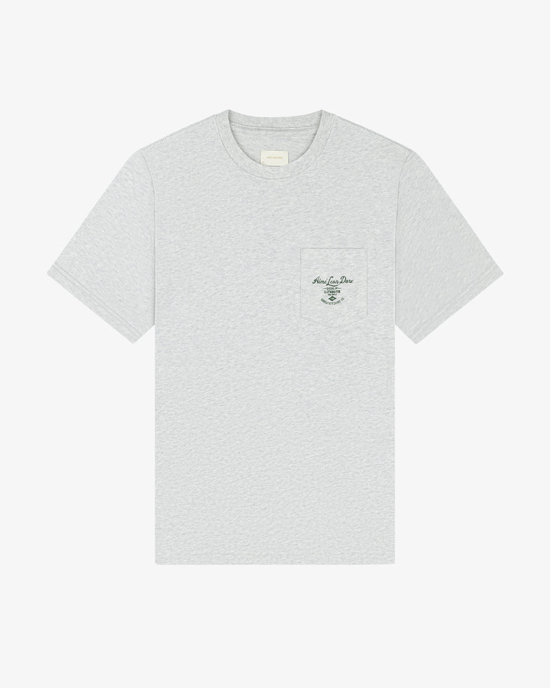 General Store Pocket Tee: Light gray short-sleeve shirt with small pocket and subtle black text on the left chest.