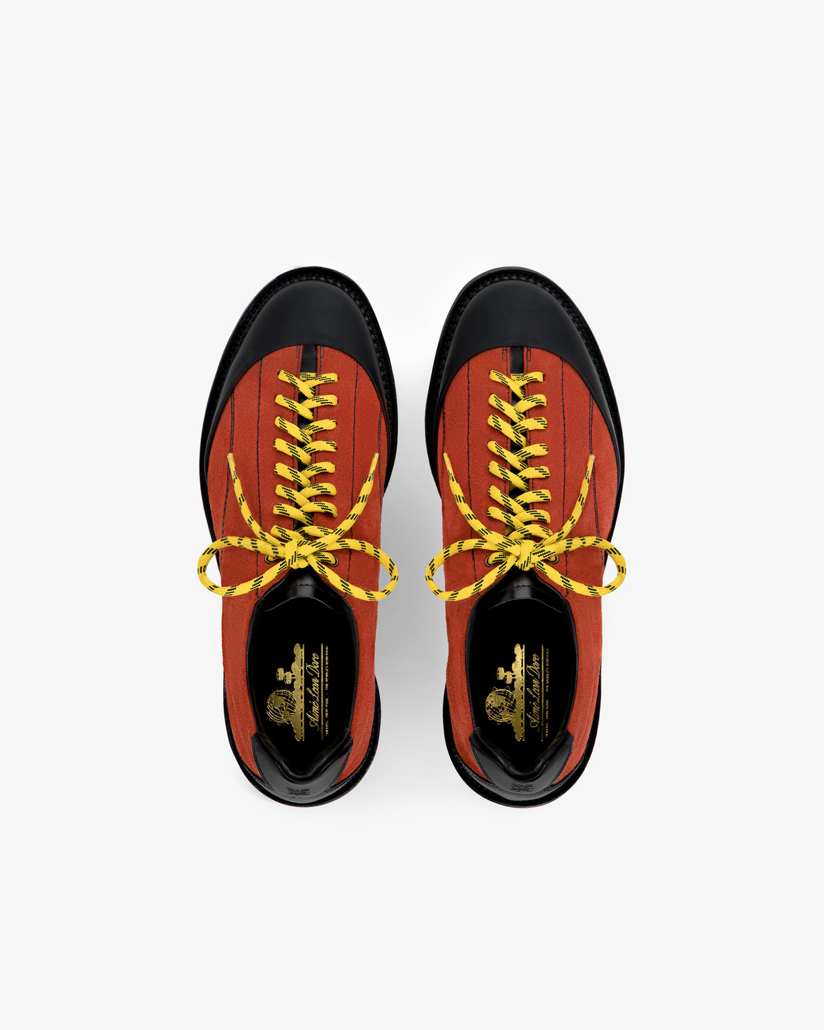 Top view of Suede Derby Hiker shoes in red and black with yellow laces, side by side on a white background.