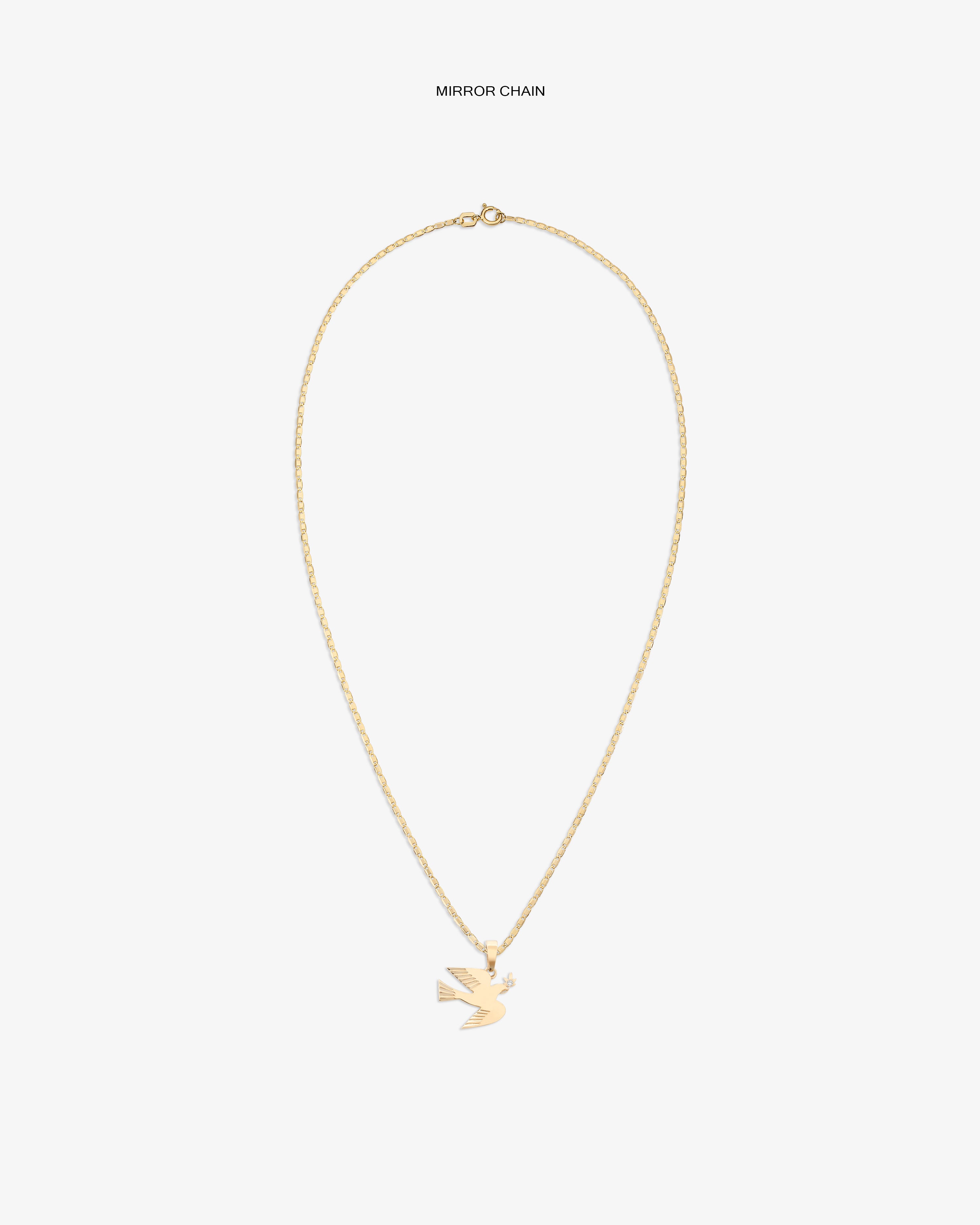 14Kt Gold Dove Pendant features a thin chain and bird-shaped charm, displayed on a plain white background.