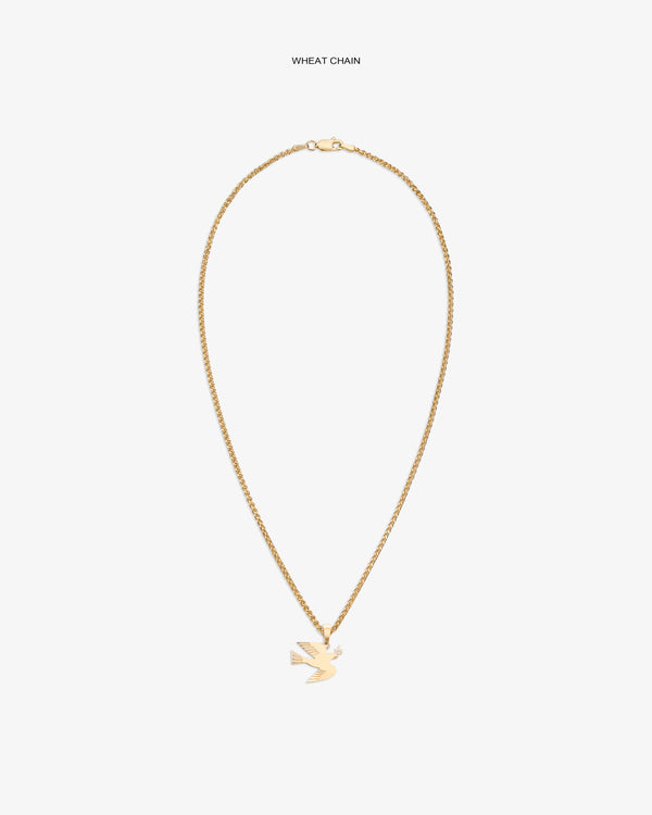 14Kt gold dove pendant displayed on a wheat chain against a white background.