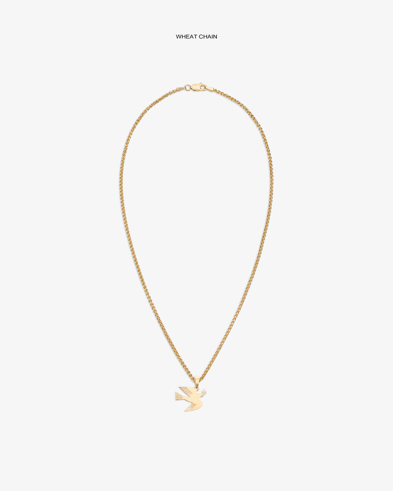 14Kt gold dove pendant displayed on a wheat chain against a white background.