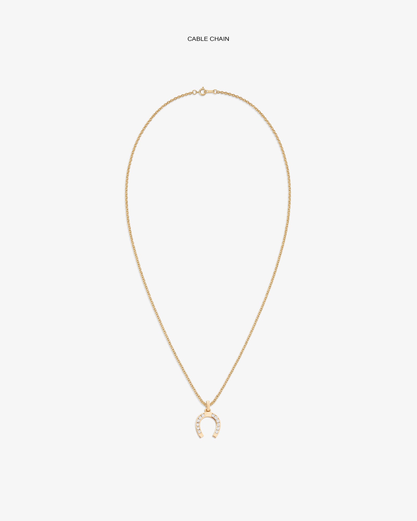 Diamond Horseshoe Pendant on a gold chain, featuring small white stones, displayed on a white background.