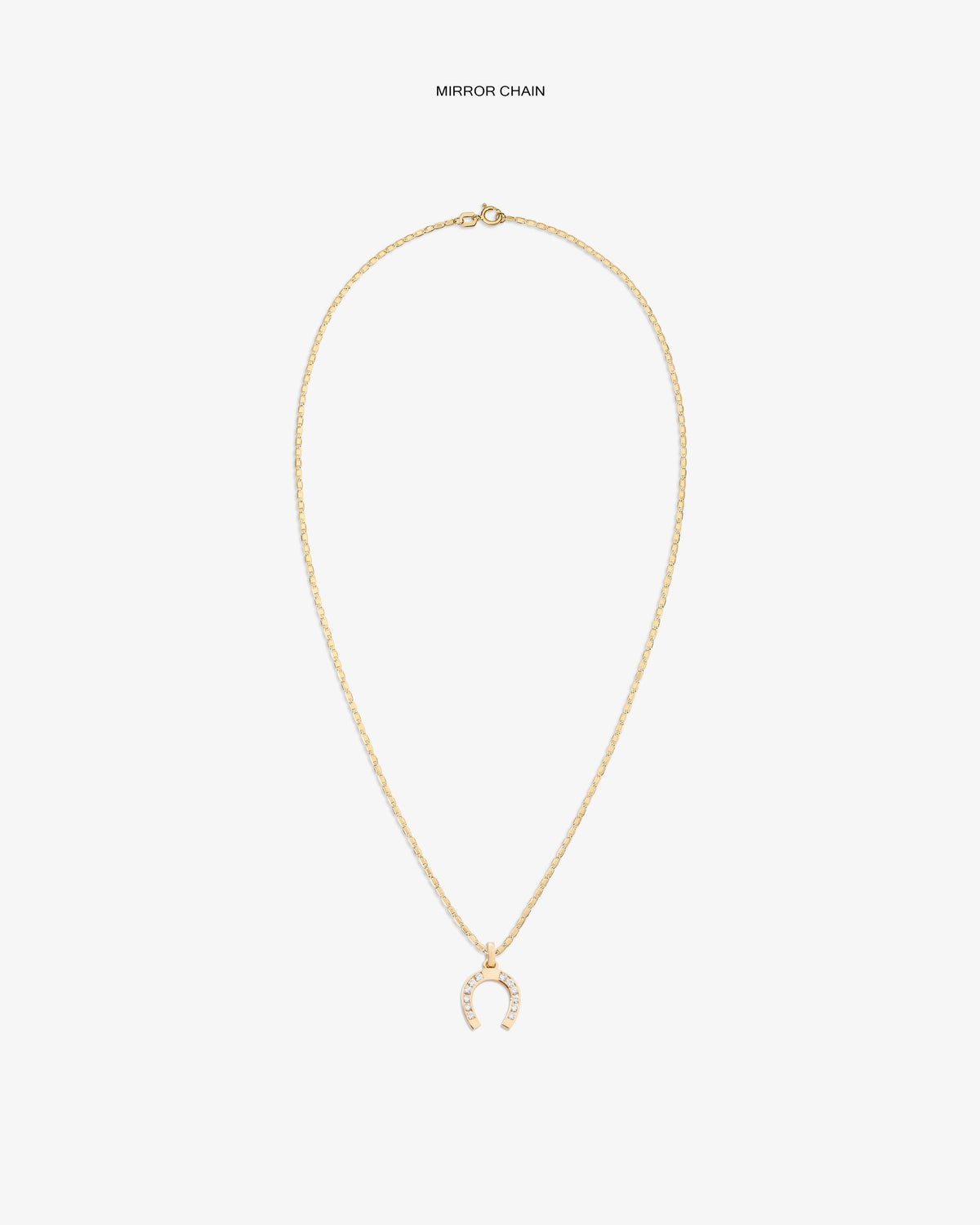 Diamond Horseshoe Pendant: Gold necklace with delicate chain and a pavé horseshoe pendant, shown on white background.