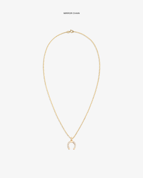 Diamond Horseshoe Pendant: Gold necklace with delicate chain and a pavé horseshoe pendant, shown on white background.