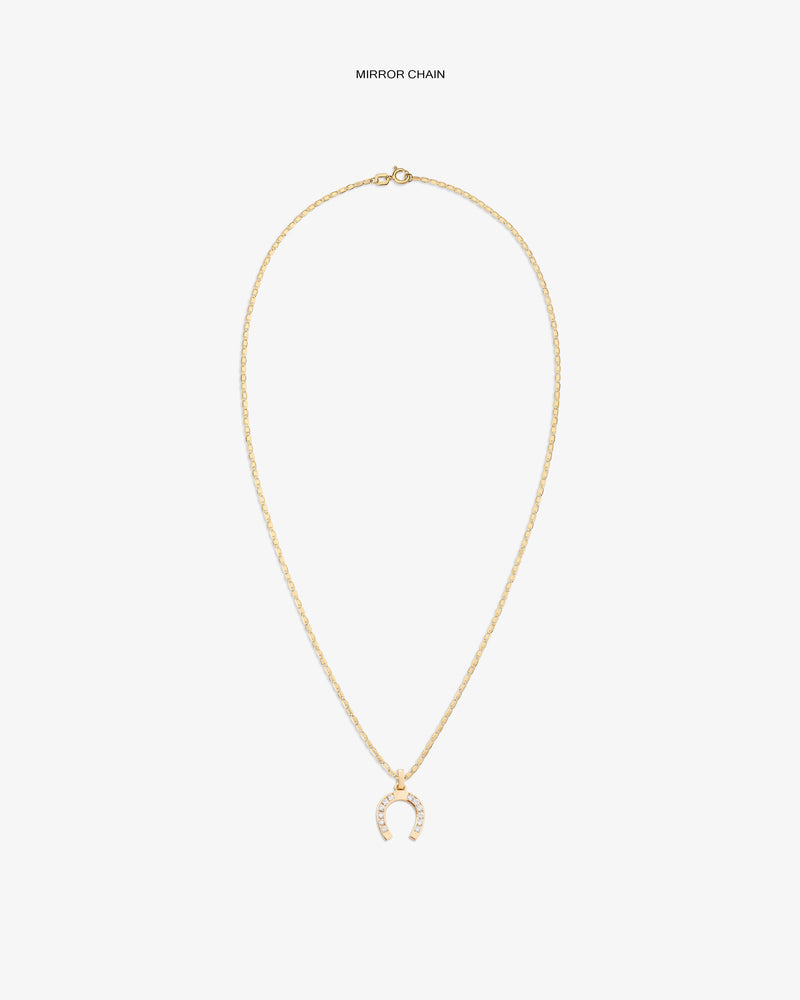 Diamond Horseshoe Pendant: Gold necklace with delicate chain and a pavé horseshoe pendant, shown on white background.