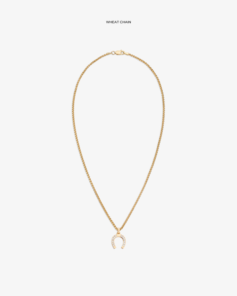 Diamond Horseshoe Pendant on gold wheat chain, shown on white background with sparkling clear stones.