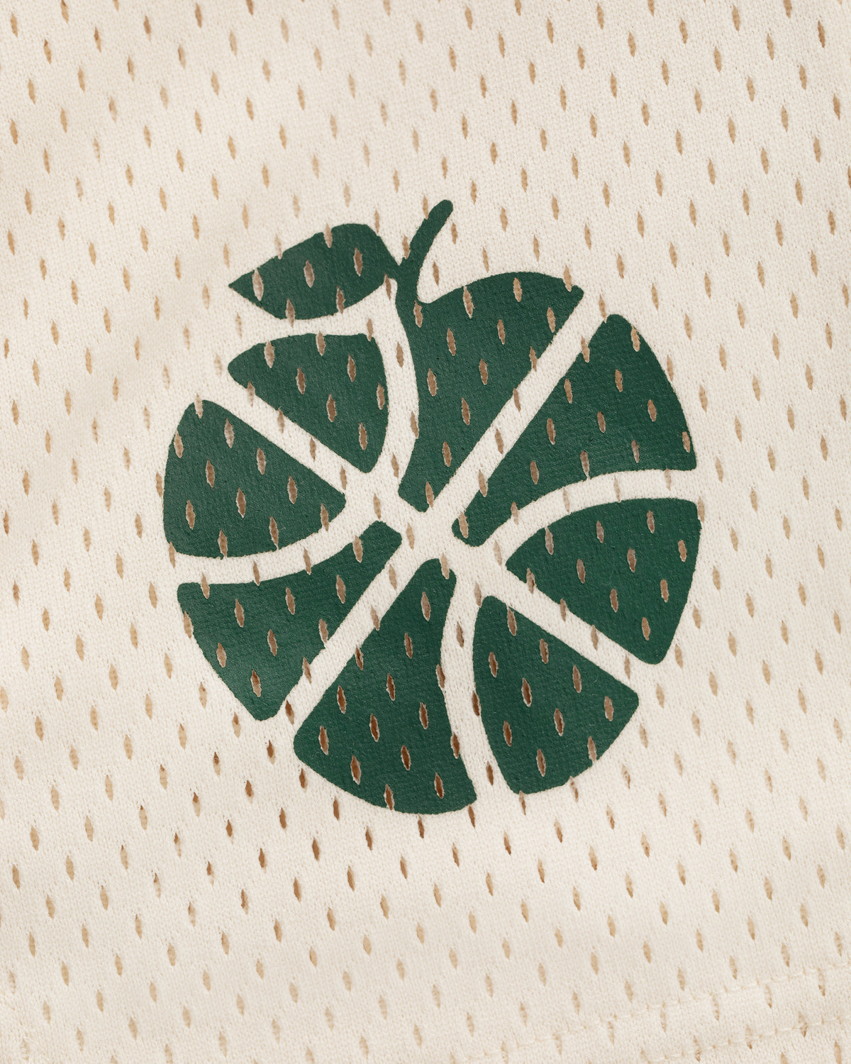 ALD / New Balance SONNY NY Gym Short features a green leaf basketball design on white perforated mesh fabric.