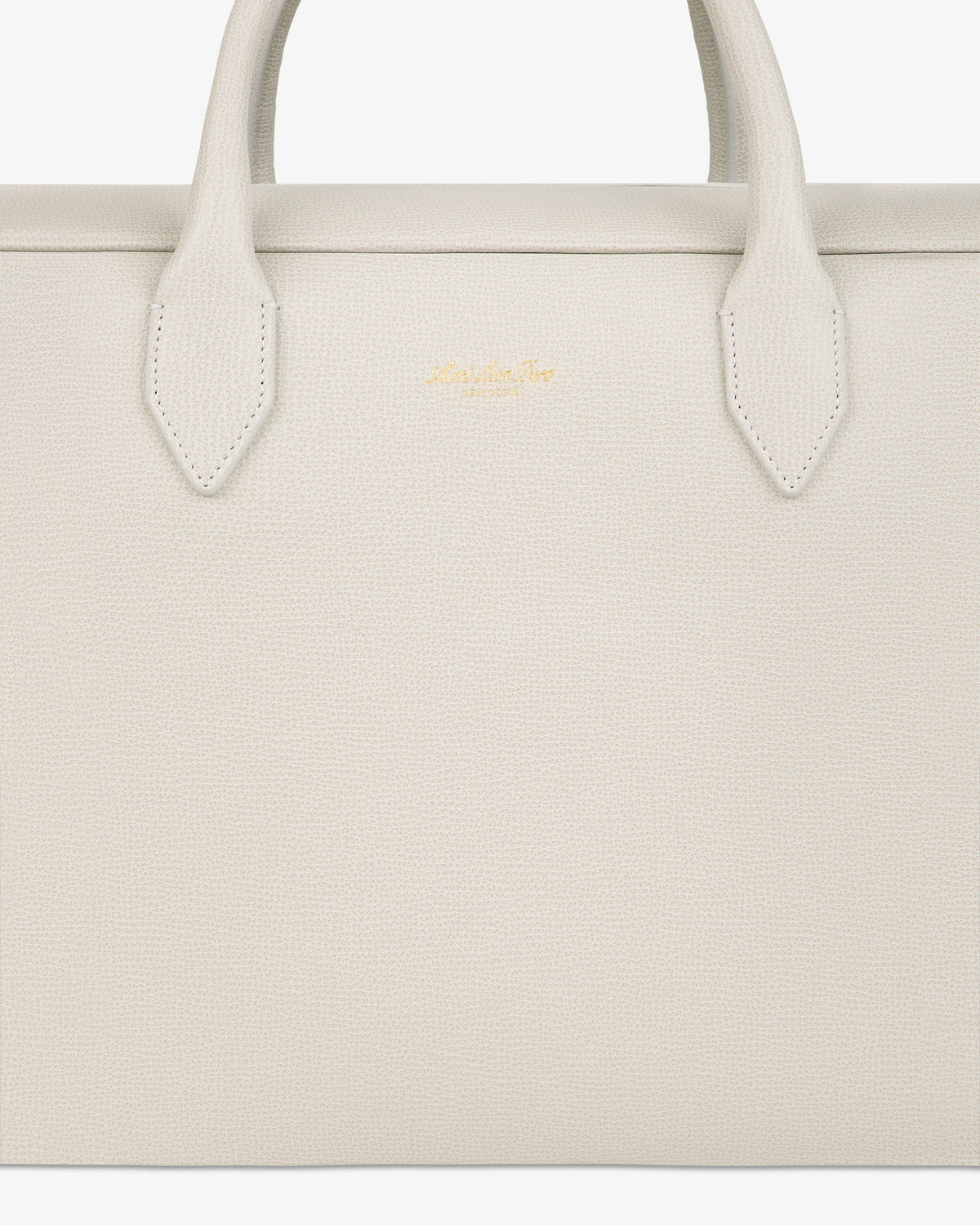 Beige Full Grain Leather Briefcase Duffle with two handles and a small gold logo near the top center.