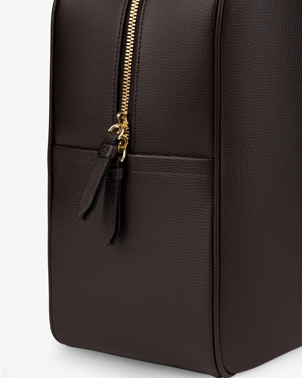 Close-up of the Full Grain Leather Briefcase Duffle in dark brown with a gold zipper and two leather pulls.